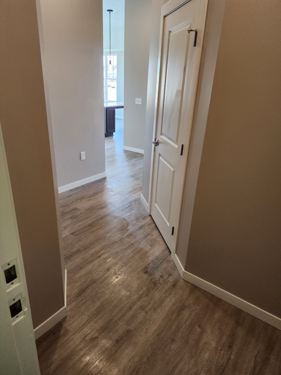 Cleaning wood floors in commercial building in Plymouth Minnesota.